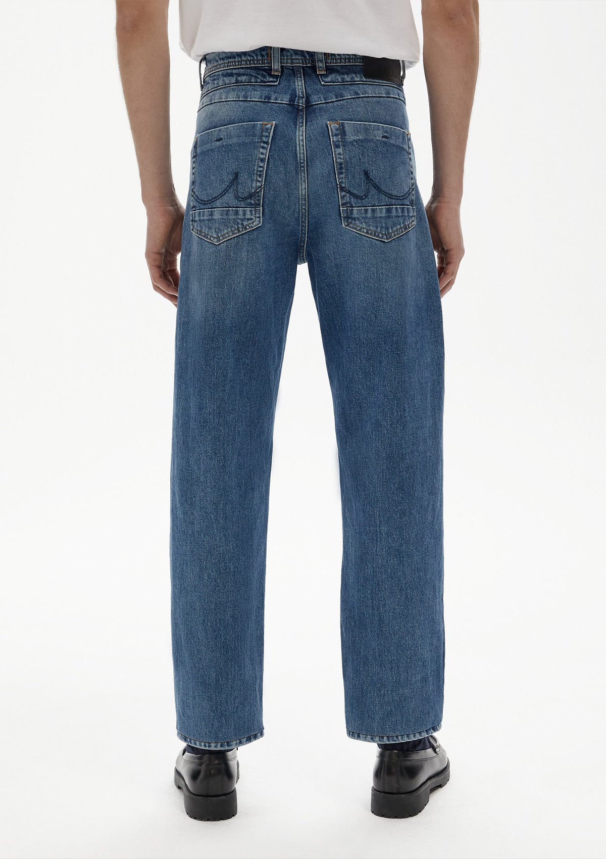 LTB Mariano Saul Mid Rise Relaxed Jean — half body back view, styled lifestyle shot, men's mid rise relaxed fit jeans